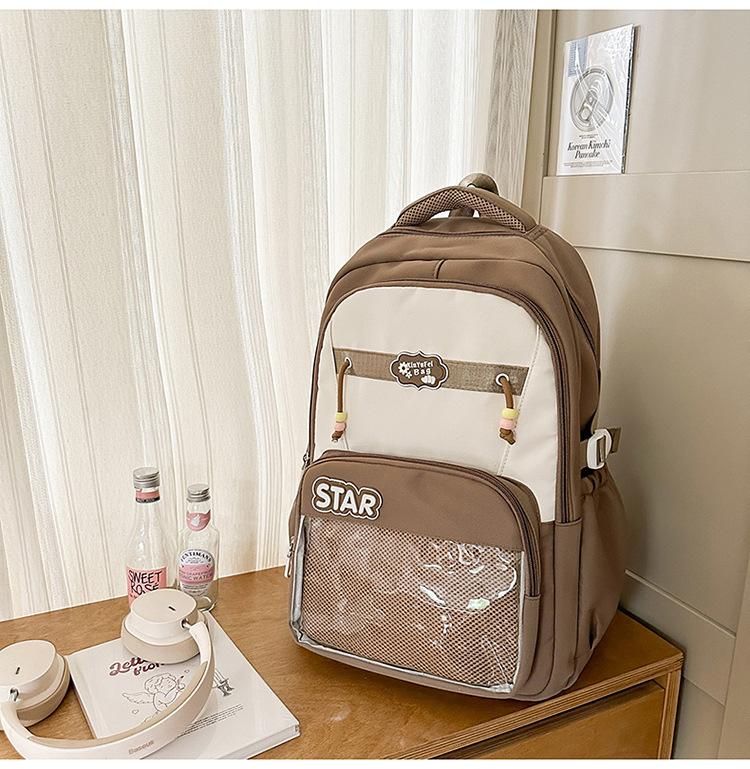 Small fresh contrasting color schoolbag niche design casual versatile children's backpack high value light burden reduction shoulder