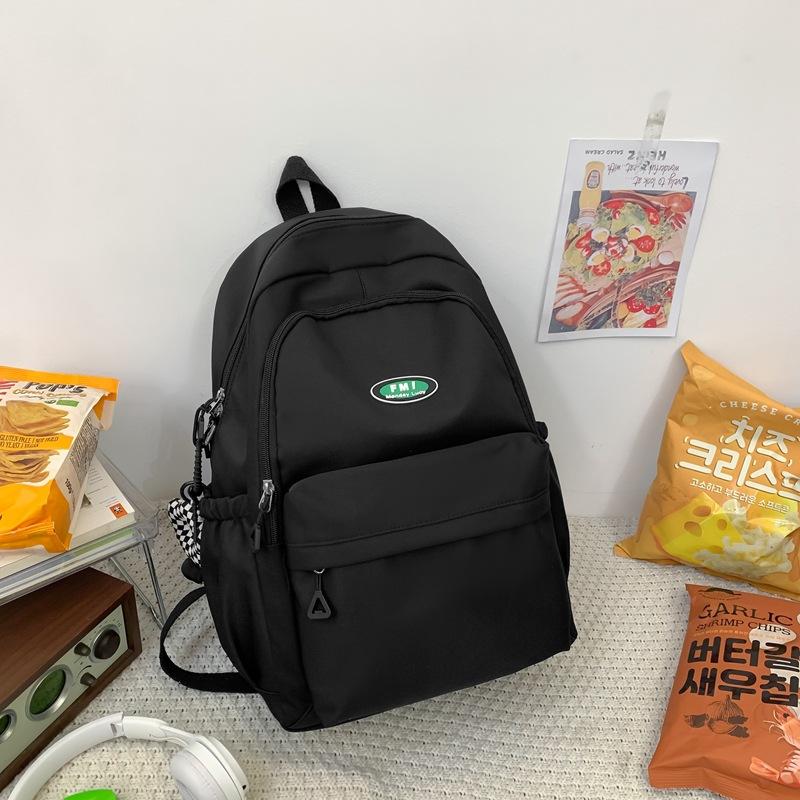 

School bag for middle school students and junior high school students New college students Simple and versatile multi-layer niche design Burden чорний