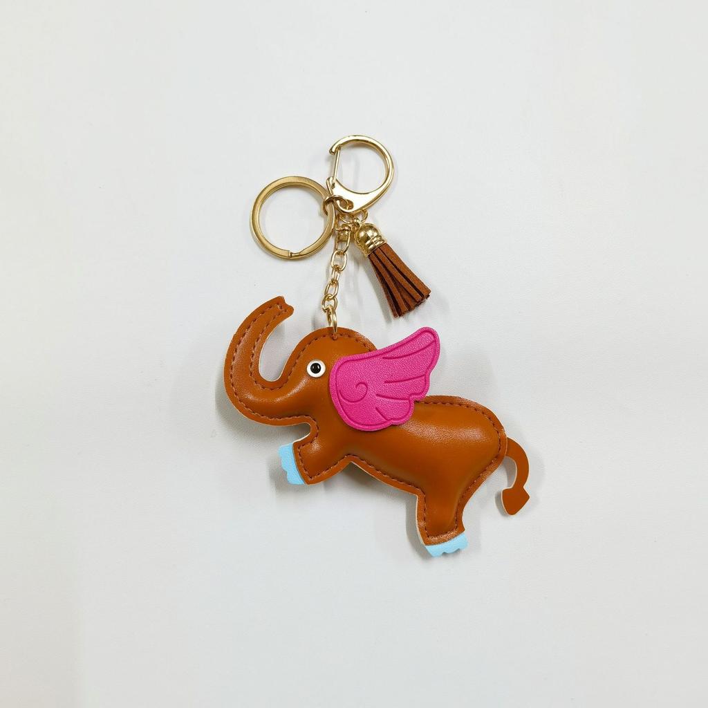 Creative flying elephant car keychain pendant leather bag pendant cute personalized car rearview mirror schoolbag pendant
