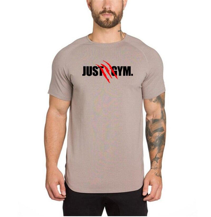 

Muscleguys Бренд Спортивная одежда Одежда Фитнес Просто Тренажерные залы футболка мужчины slim fit бодибилдинг футболка тренировка футболка homme slim fit футболка XXL розовый