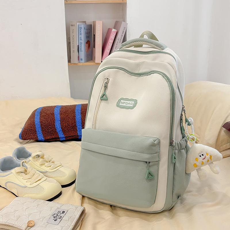 2025 summer new large-capacity literary and versatile high-value schoolbag female junior high school students simple and lightweight backpack