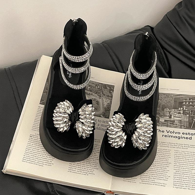 

Fashion exquisite bow thick-soled rhinestone sandals women s 2025 summer new fairy wind heightening Roman shoes sandals 35