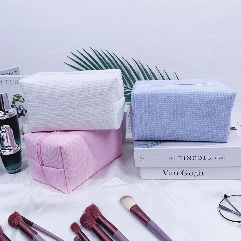 Trending Waffle Cosmetic Bag: Solid Color, Spacious, Women's Handheld Toiletry Organizer