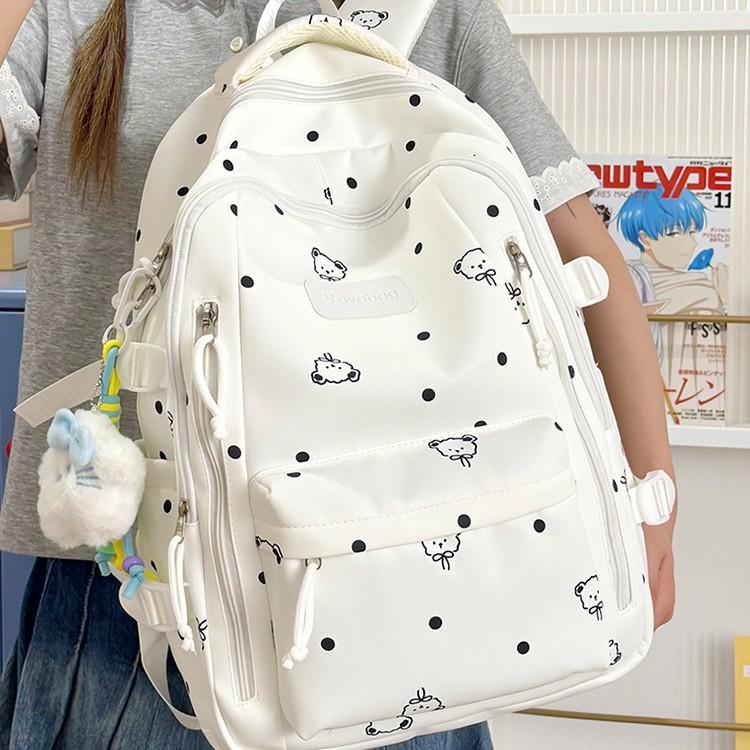 Schoolbag wholesale new middle and high school school bag backpack Japanese versatile casual fashion doll pendant large capacity backpack