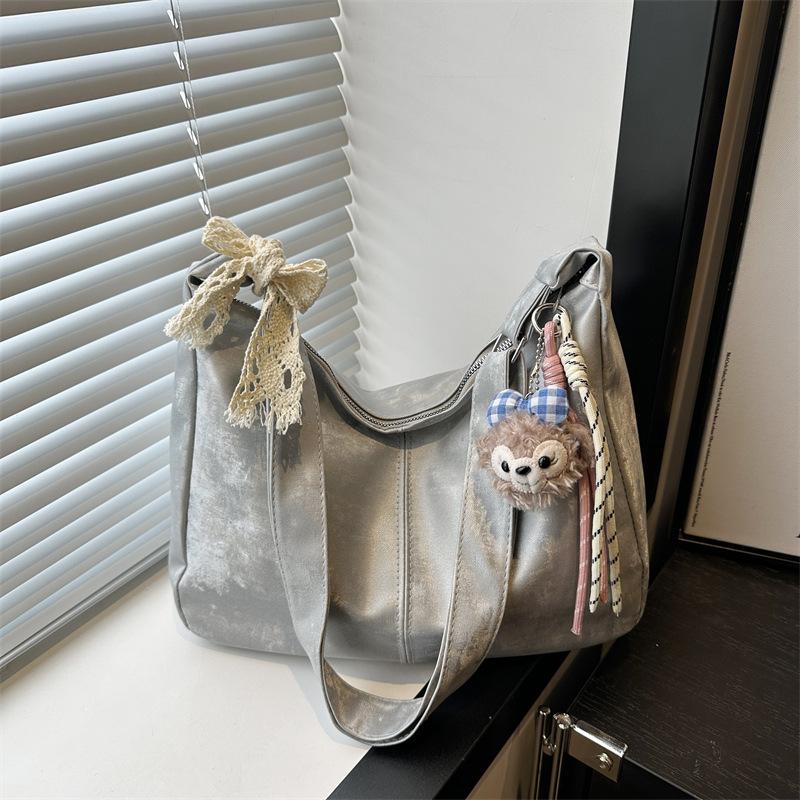 

Новый класс студентов-коммутеров большая вместимость повседневная сумка-мессенджер текстура плечевая сумка подмышку женская no pendant серебряный