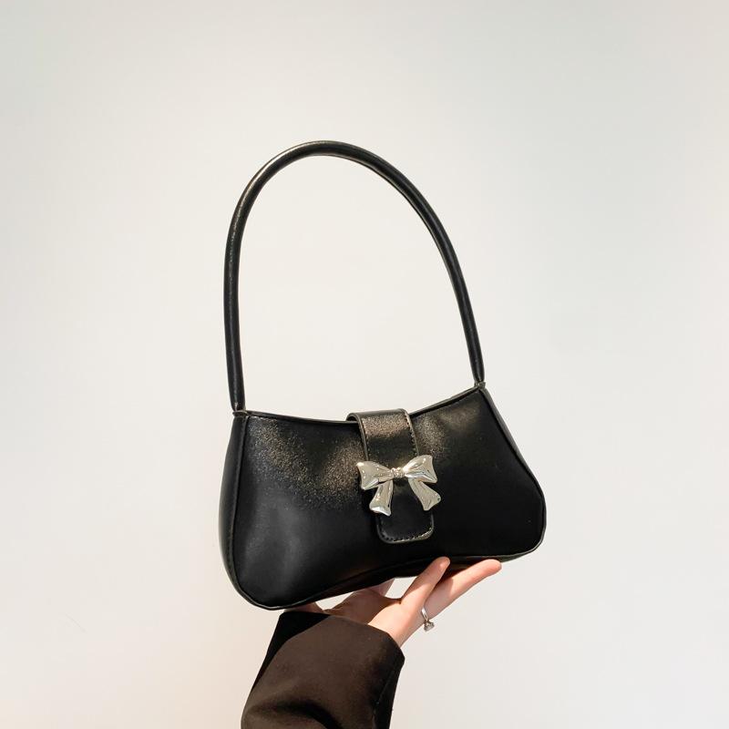 Casual texture butterfly decorative bag women's 2025 new trendy fashion simple solid color foreign style single shoulder armpit baguette