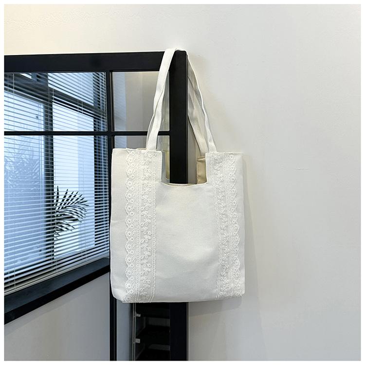 Koreansk stil enkel och stor kapacitet 2025 sommar ny axelväska utländsk stil mode toteväska för pendling spetsväska