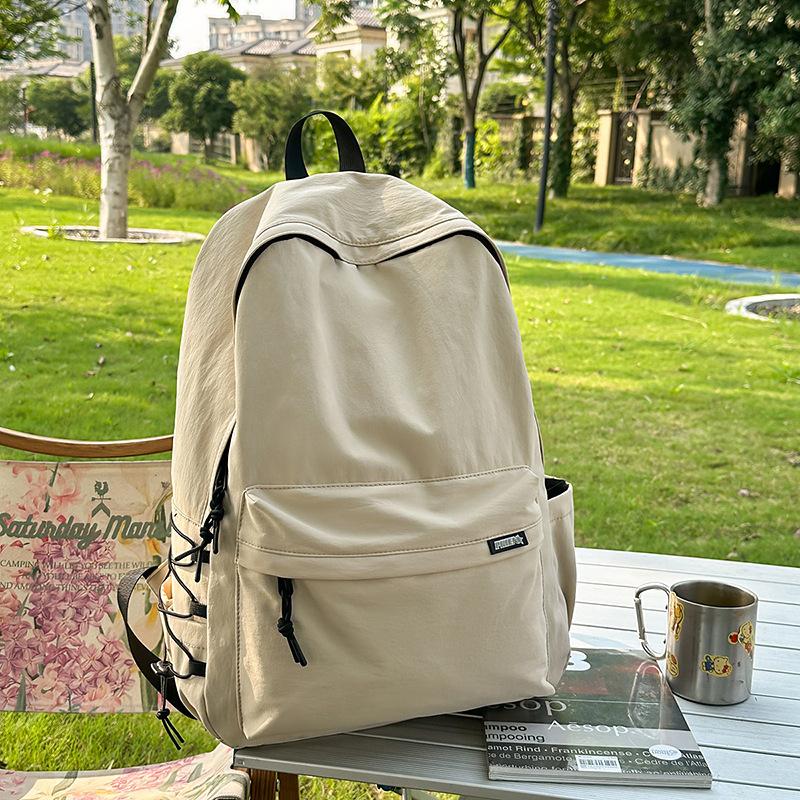 Large capacity schoolbag male high school students college students Japanese travel backpack female junior high school students computer backpack tide