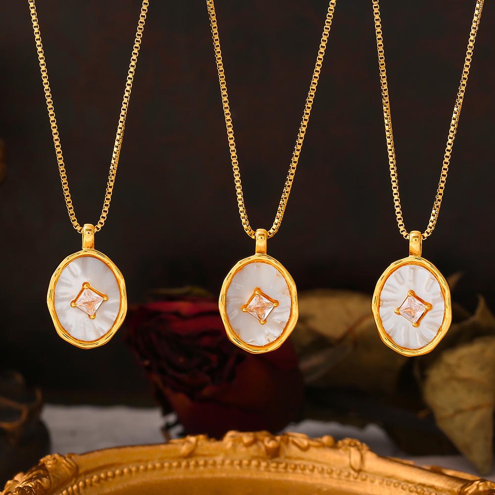 

18k Gold-Plated Titanium Steel Clavicle Chain with Zircon and Mother-of-Pearl Oval Copper Pendant