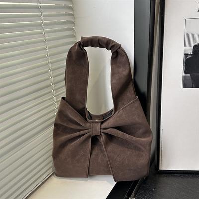 Ein Nischendesign mit einer Schleife, einzigartig, modisch und stilvoll, Tragetasche mit großem Fassungsvermögen für die Schulter oder unter dem Arm