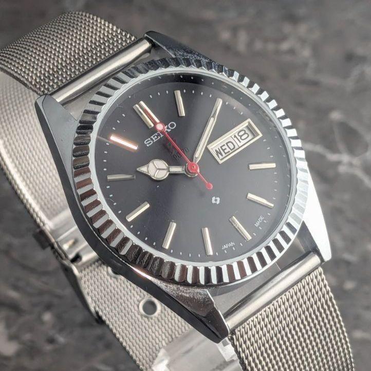 Used SEIKO Automatic Vintage Black Dial Bar Index 3-Hand Day-Date See-Through Case Back Men's Watch