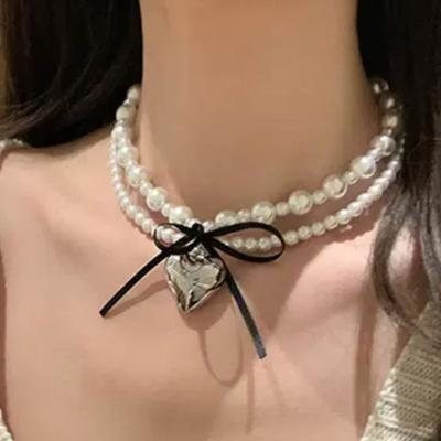 In Sweet Cool Wind Ribbon Bow Love Double Pearl Necklace Women's Niche Design Sense Collarbone Chain Tide~