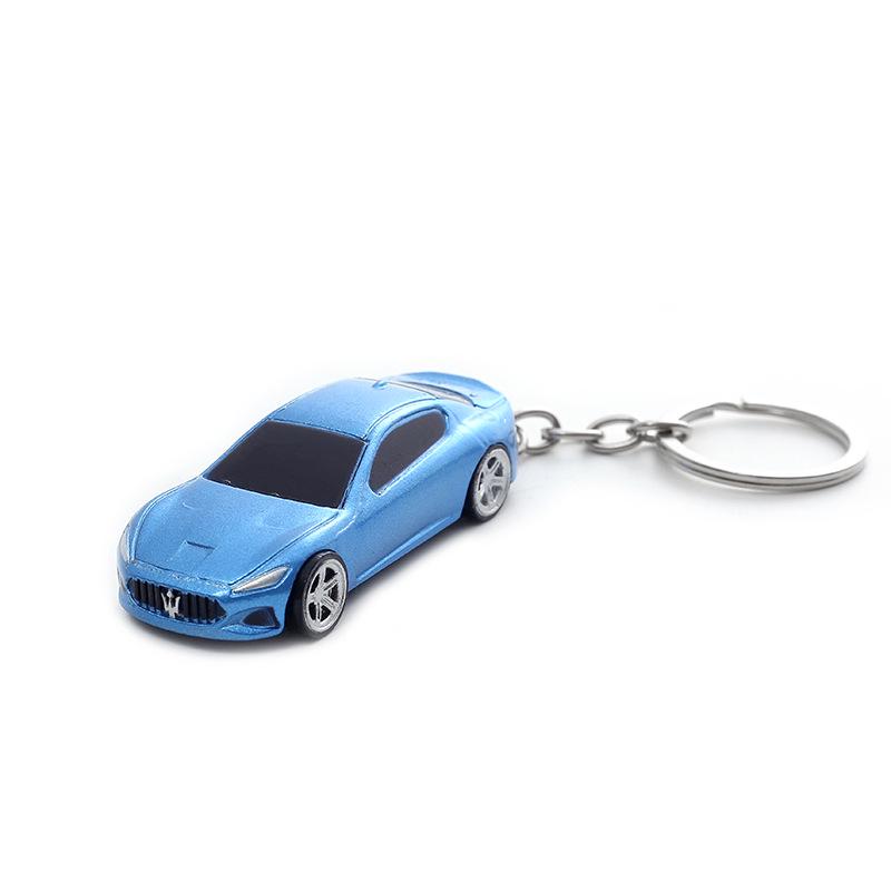 

«Хит продаж: игрушечная металлическая модель автомобиля и брелок для выживания»