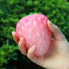 1 Simulated Color Changing Strawberry Toy, A Stress Relief Toy That Changes Color In The Sunlight, and A Decompression Rebound