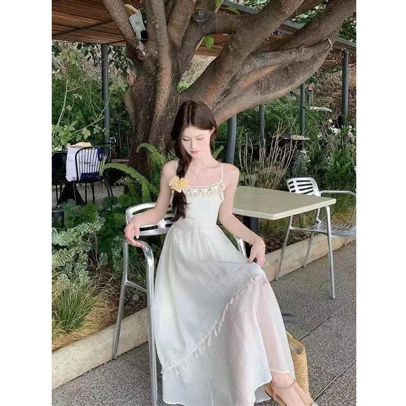 Holiday Wind Fringe Splicing Suspender Dress Women's Summer 2026 New Waist Irregular Gentle First Love Long Dress