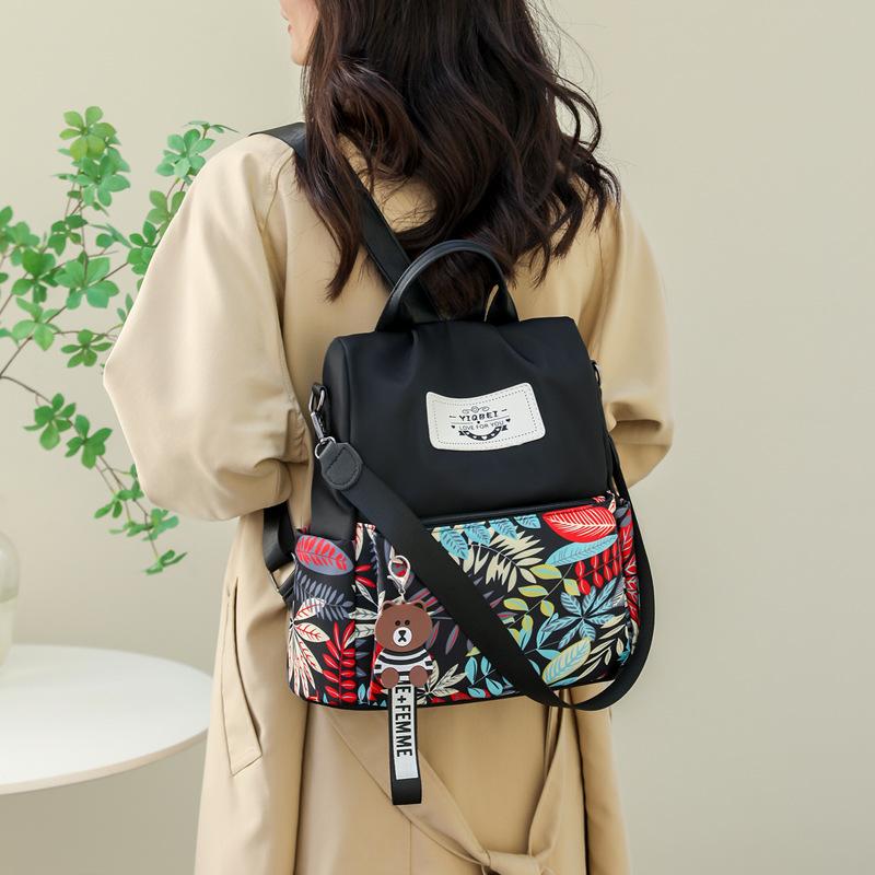 Anti-theft backpack women's casual nylon backpack fashion printed schoolbag light tide