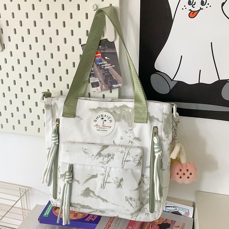 Children's schoolbag Elementary school student Junior high school girl college student Printed backpack