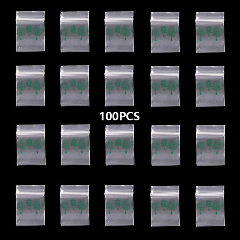 100 st Liten blixtlåsväska Smile Skull Mönster Bärbar förvaringsväska Transparent