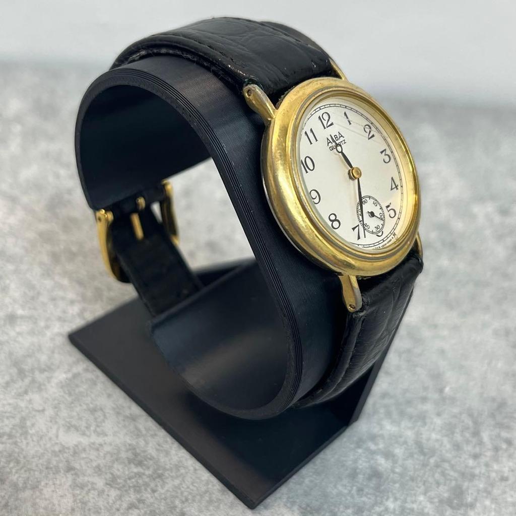 Used ALBA quartz watch gold black