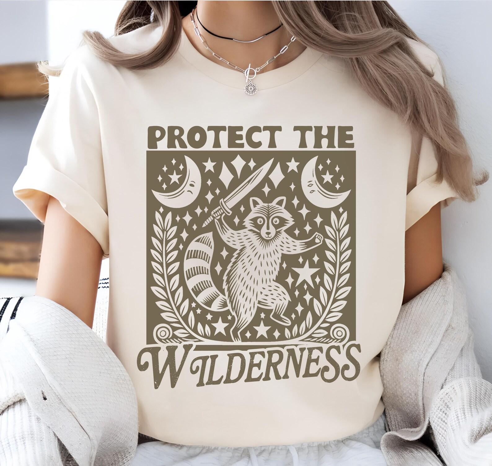 funny raccoon linocut style art - defend the wilderness shirt, conservation animal welfare pro environment climate activist T-Shirt M