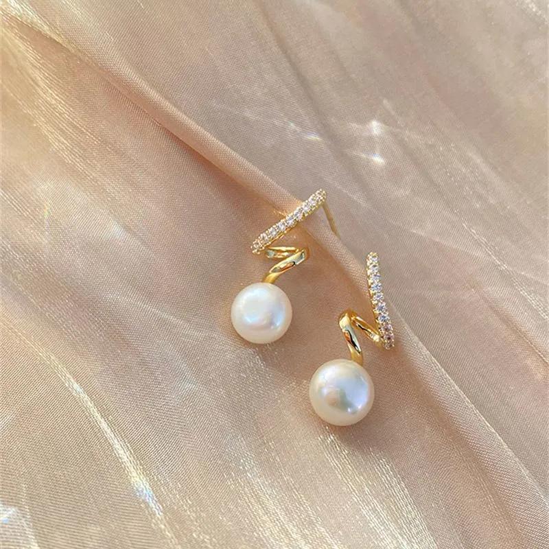 Twisted Hoop Earrings with Embedded Rhinestones and Hanging Pearl Dangle Minimalist Design Lightweight Metal Alloy Jewelry for Women