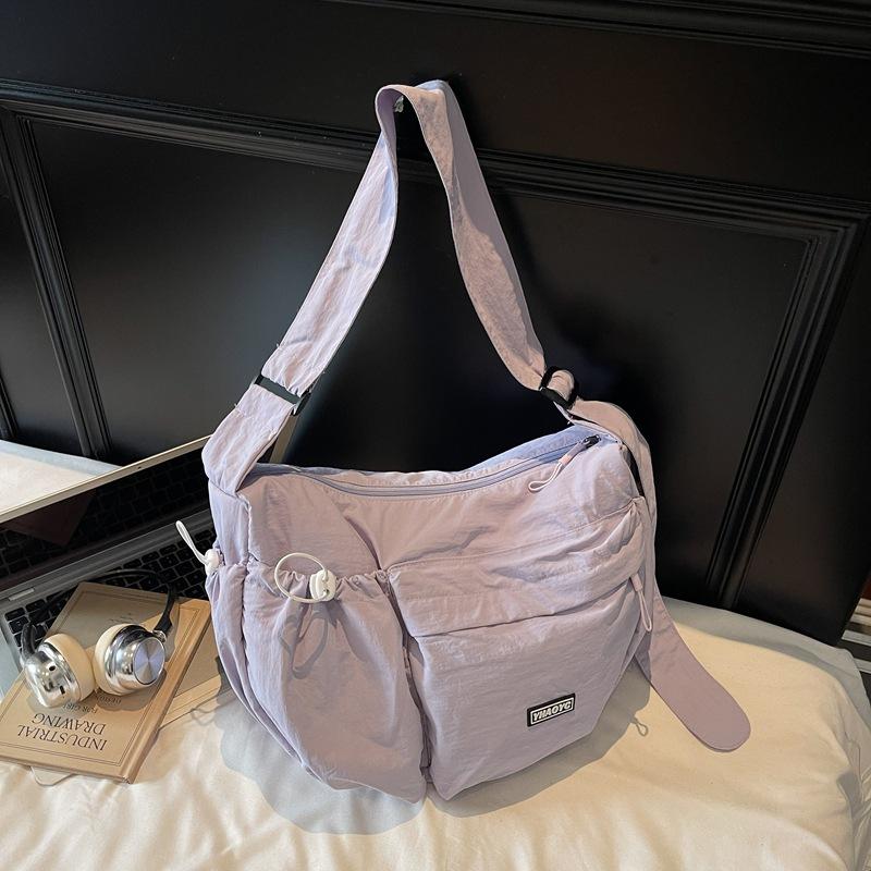 

Crossbody bag 2025 new large-capacity nylon bag women s casual and lightweight shoulder bag student versatile commuter bag фиолетовый