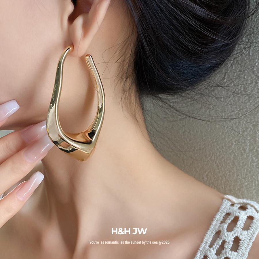 Silver needle geometric irregular hollow earrings light luxury high-end earrings simple cold wind earrings design sense niche