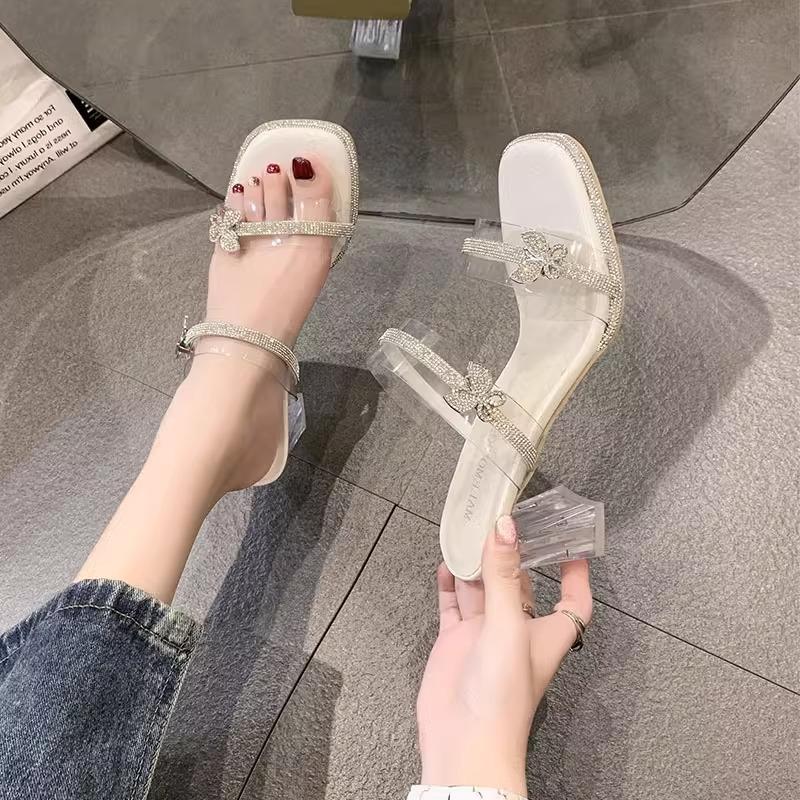 Fairy wind high-heeled slippers female summer wear 2025 new transparent rhinestone one-word drag crystal thick-heeled cool slippers