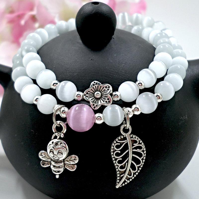 

Браслет ручної роботи з корейського кришталю та халцедону Котяче око для жінок