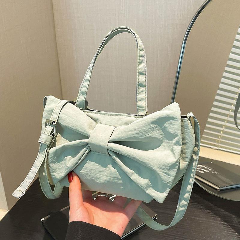 

Летняя Летняя Премиум Чувство Нишевая Сумка Кроссбоди Женская 2025 Новая Сумка Под Мышку Мода Индивидуальность Бант Тканевая Сумка