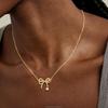 Glossy Bow Zircon Pendant Necklace with Brass Gold Tone Chain for Women