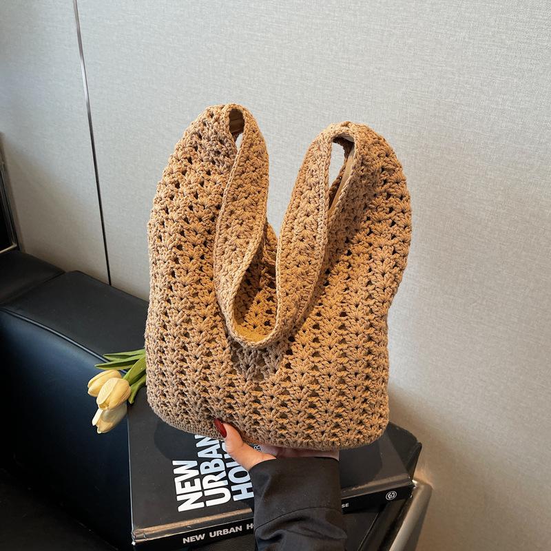 Woven bag women's large-capacity new casual shoulder armpit bag knitted seaside vacation beach bag