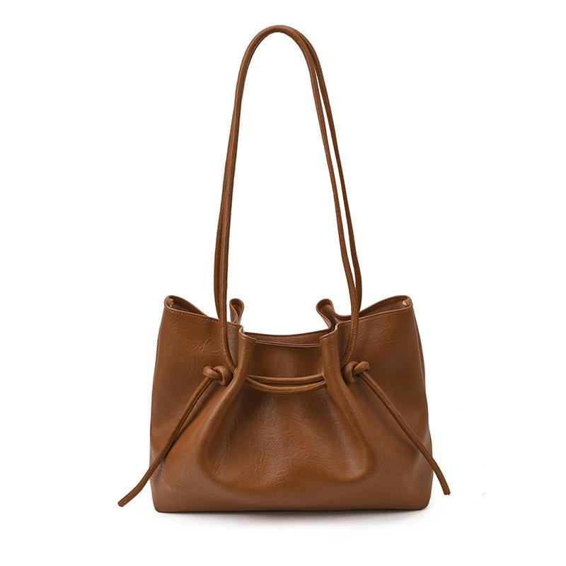 High-End Women's Large Capacity Textured Crossbody Drawstring Shoulder Bag for Casual Outdoor Use
