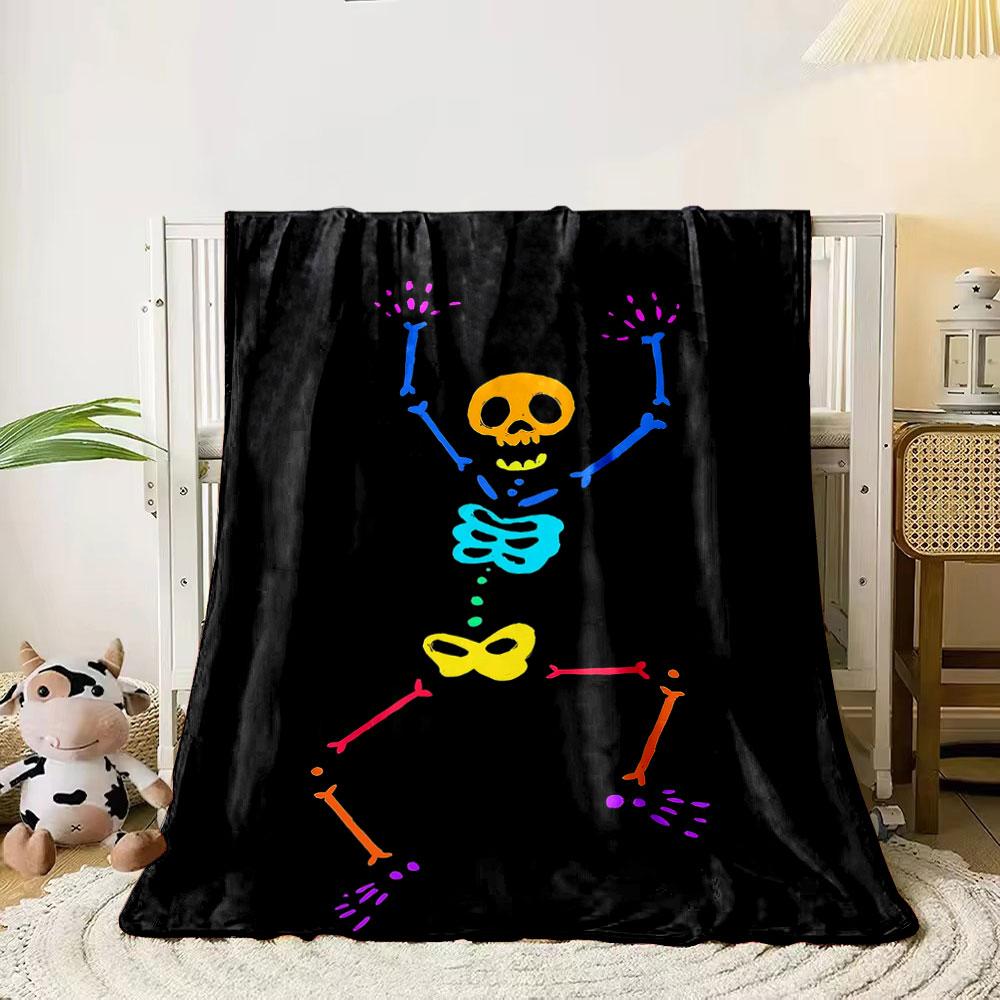 A colorful, abstract skeleton figure with raised arms on a black background. for all seasons blanket lunch break throw gift 80cm x 120cm