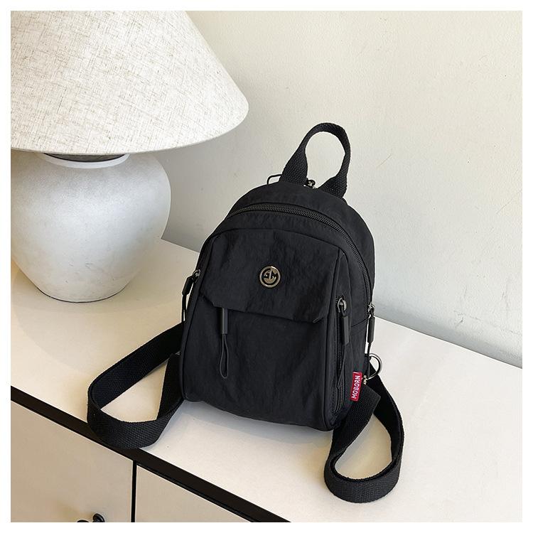 Schoolbag custom logo new niche design backpack women's simple versatile large capacity casual high value backpack