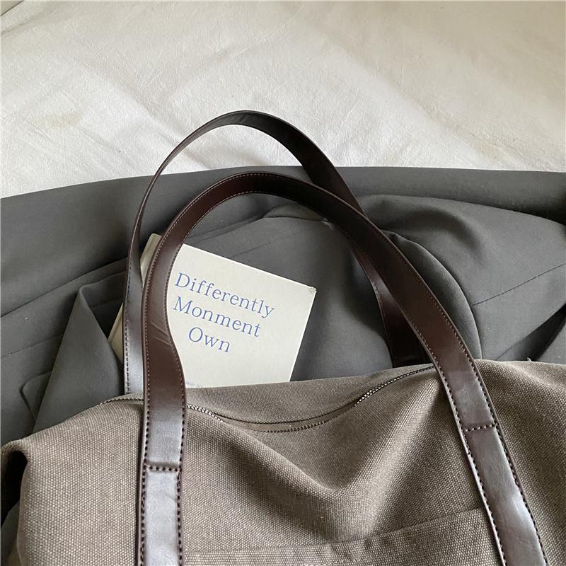 Stylish Canvas Shoulder Bag for Women with Wide Strap and Spacious Design