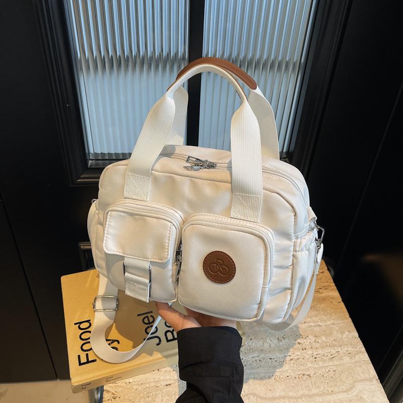 

Retro casual hand pillow bag women s new autumn and winter large-capacity versatile fashion shoulder messenger bag покинуть белый