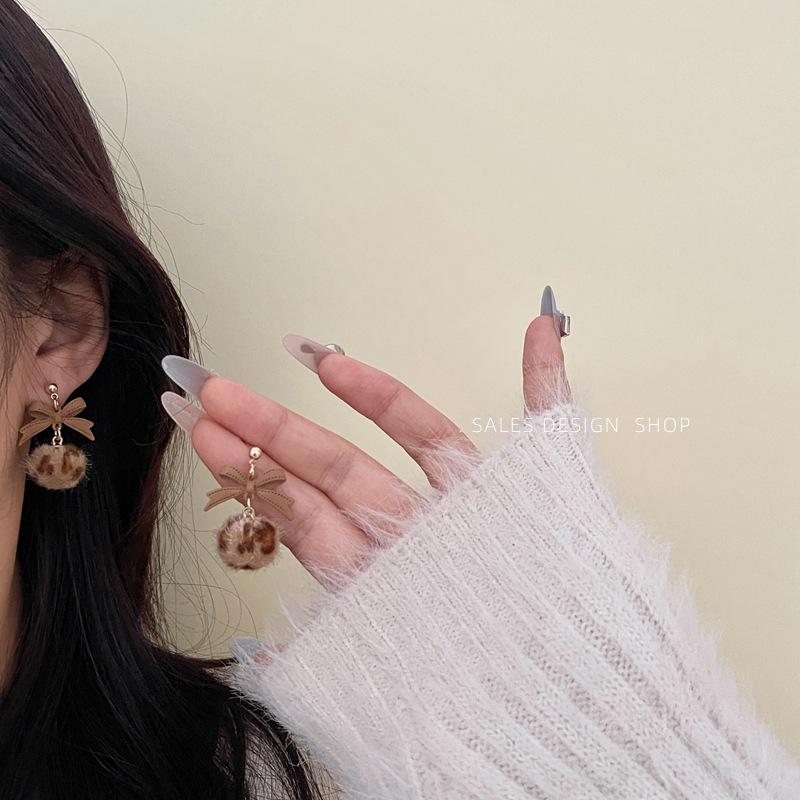 Korean Bow Leopard Plush Pompon Earrings - Milk Coffee Color, Light Luxury, Versatile Silver Needle Jewelry for Women
