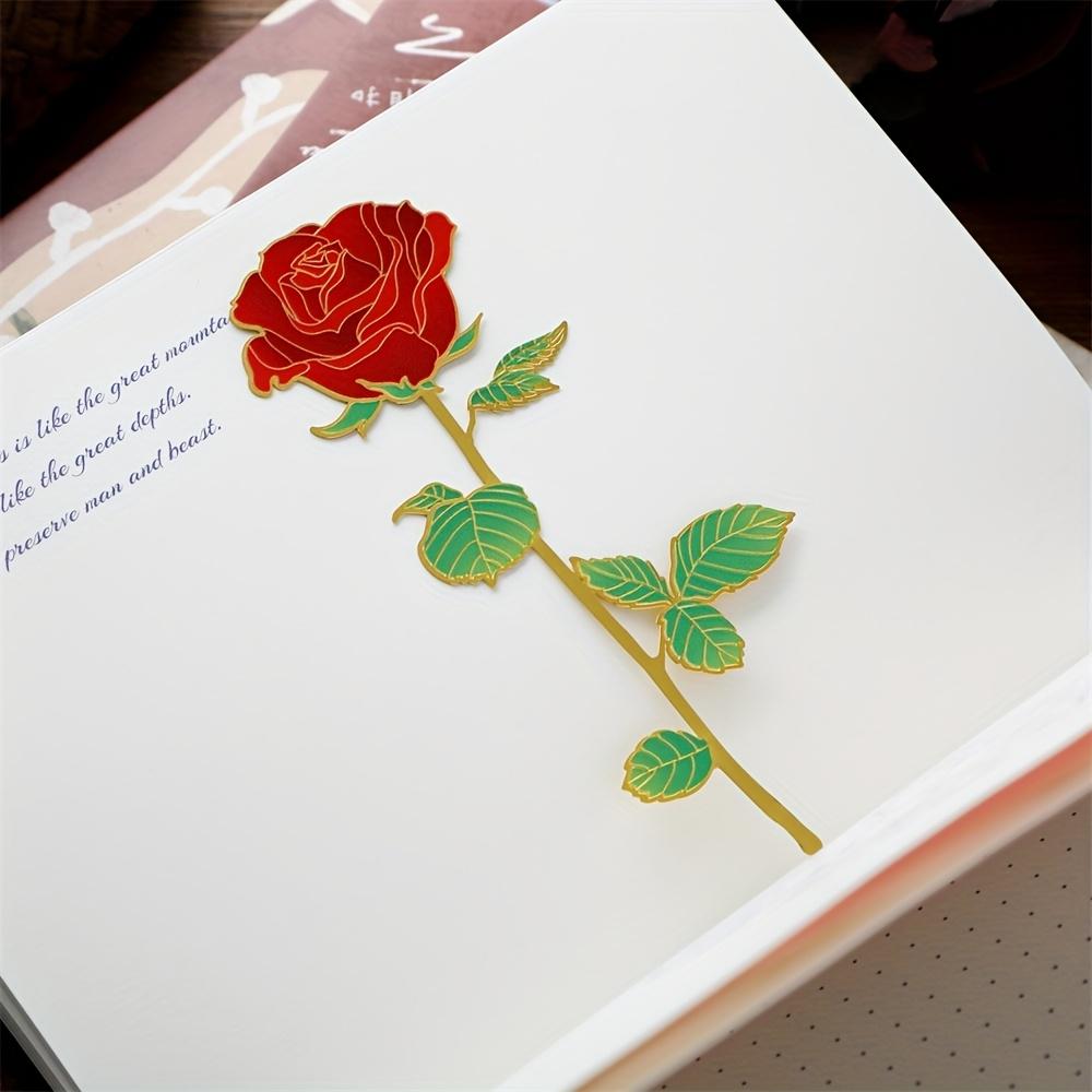 Ein einzelnes elegantes rotes Rosen-Metall-Lesezeichen mit einem goldenen Stiel - Das perfekte Geschenk für den Valentinstag, den Muttertag, Geburtstage
