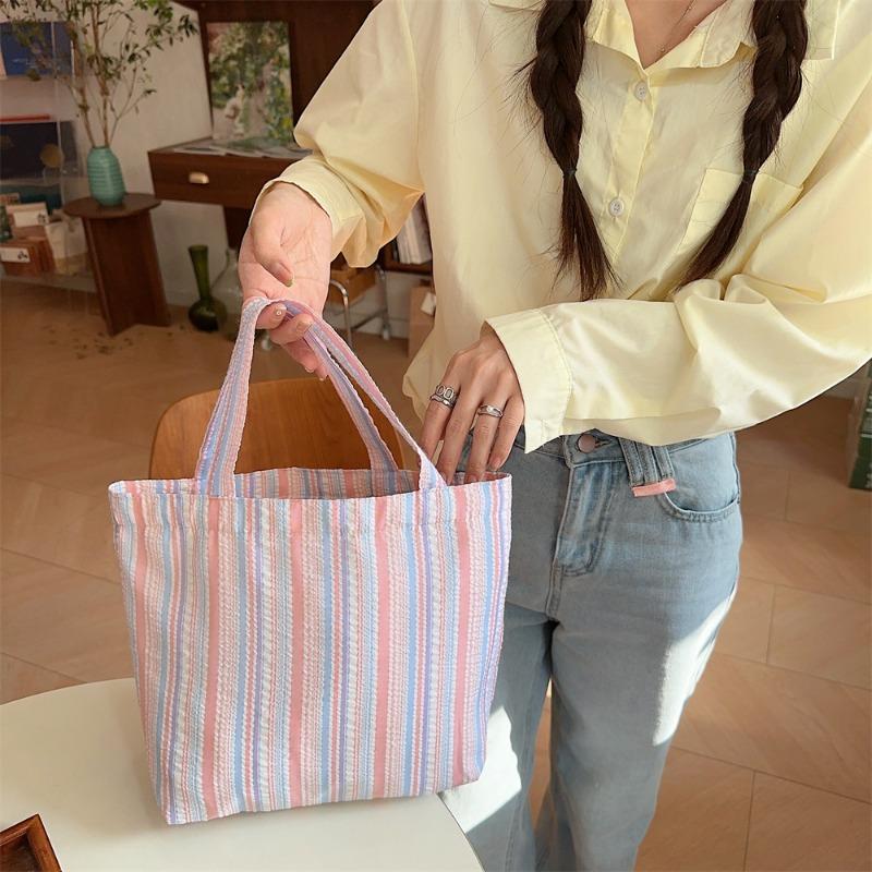 Spring and summer new pleated striped canvas bag portable bento bag storage bag large capacity hand carry