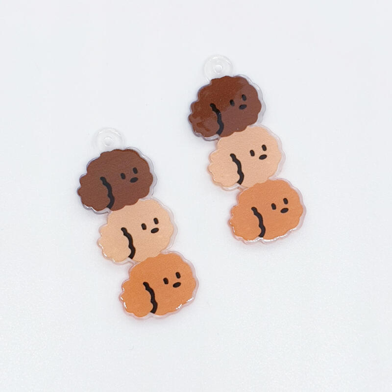 Materials for making a poodle puppy pendant and danggo skewer keychain