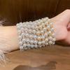 European-American Vintage Pearl & Diamond Open Bangle: Luxurious, Versatile Court-Style Bracelet