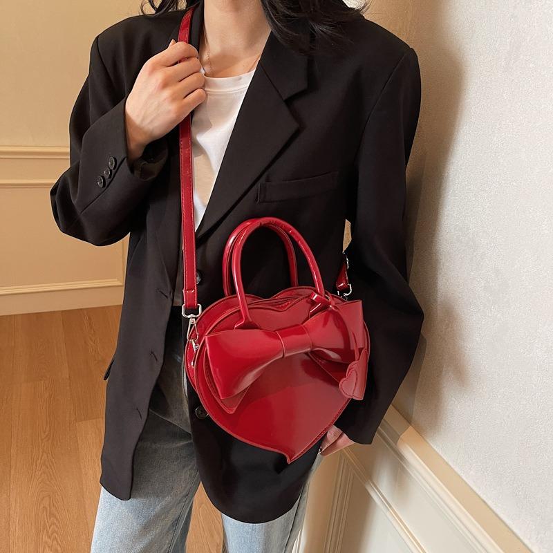 Premium bow spring and summer new cute love bag hand carry versatile shoulder messenger bag