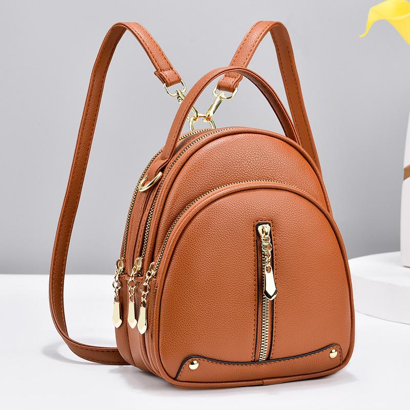 Malá taška Módní korejská verze Trendy Malý batoh Simple Atmosphere Jedno rameno Crossbody Malá kulatá taška Dvojité rameno Dámská taška