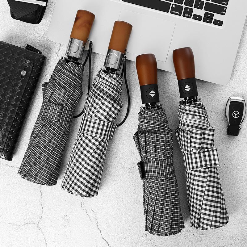 Ten-bone windproof umbrella three-fold automatic umbrella folding umbrella men's solid wood stripe plus umbrella