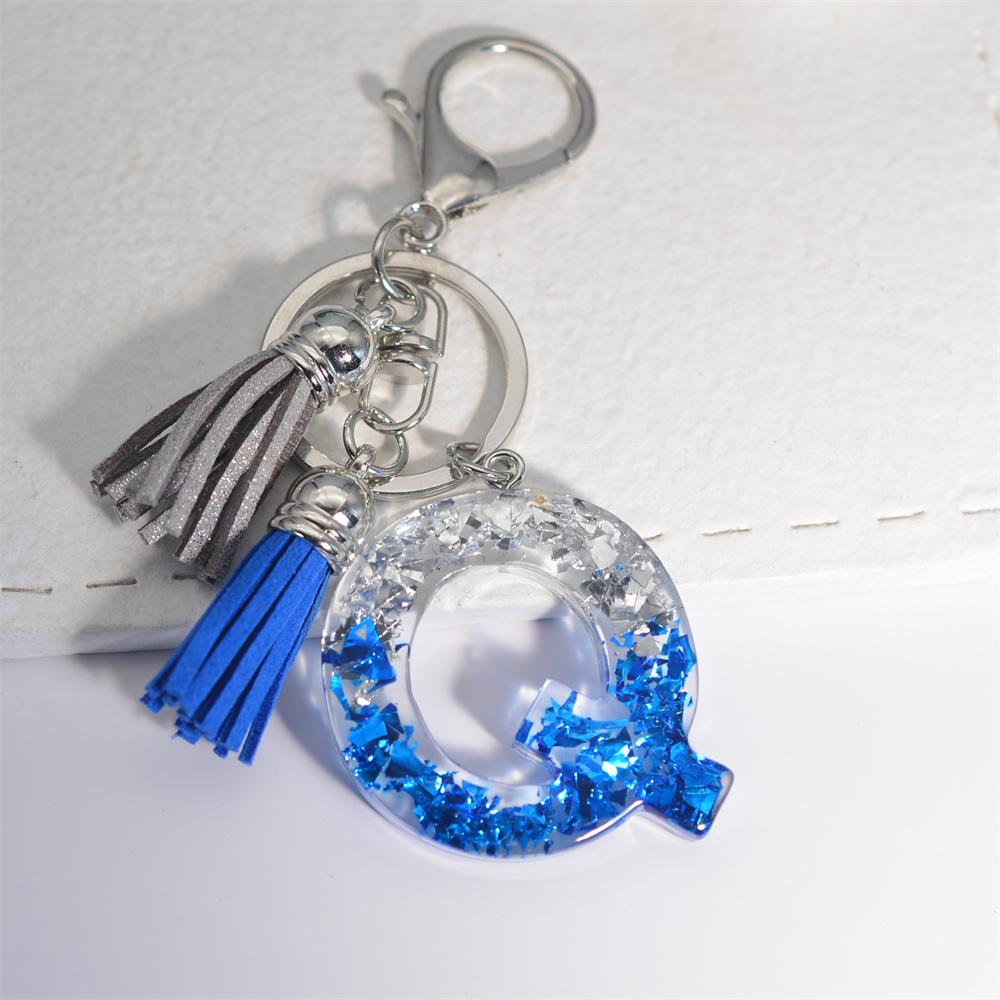 Креативные брелки из смолы с 26 буквами и кисточками — фото 23