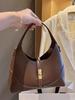 Ctrasting color niche design dumpling bag versatile commuter portable shoulder crossbody bag handbag