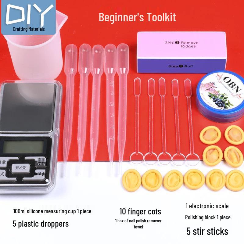 DIY Epoxid-Werkzeugset mit Handschuhen, Messbechern, Waage, Pinzetten, Tropfer, Schleifpapier, Politur und Stanze.