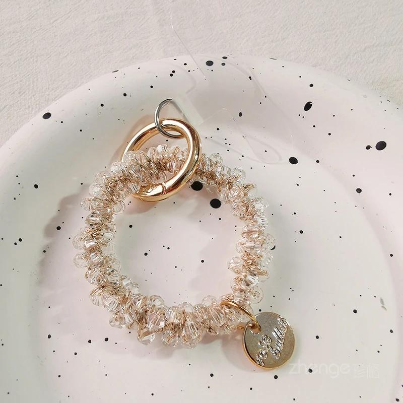 

Mobile Phone Lanyard Elastic Scrunchie Crystal Bracelet Pendant Portable Chain Simple Keychain Mobile Phone Case Universal прозорий