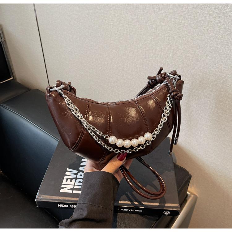 

Нишевая сумка женская 2025 весна новая мода сумка-рог модная сумка-пельмень сумка на плечо сумка-мессенджер темно-коричневого